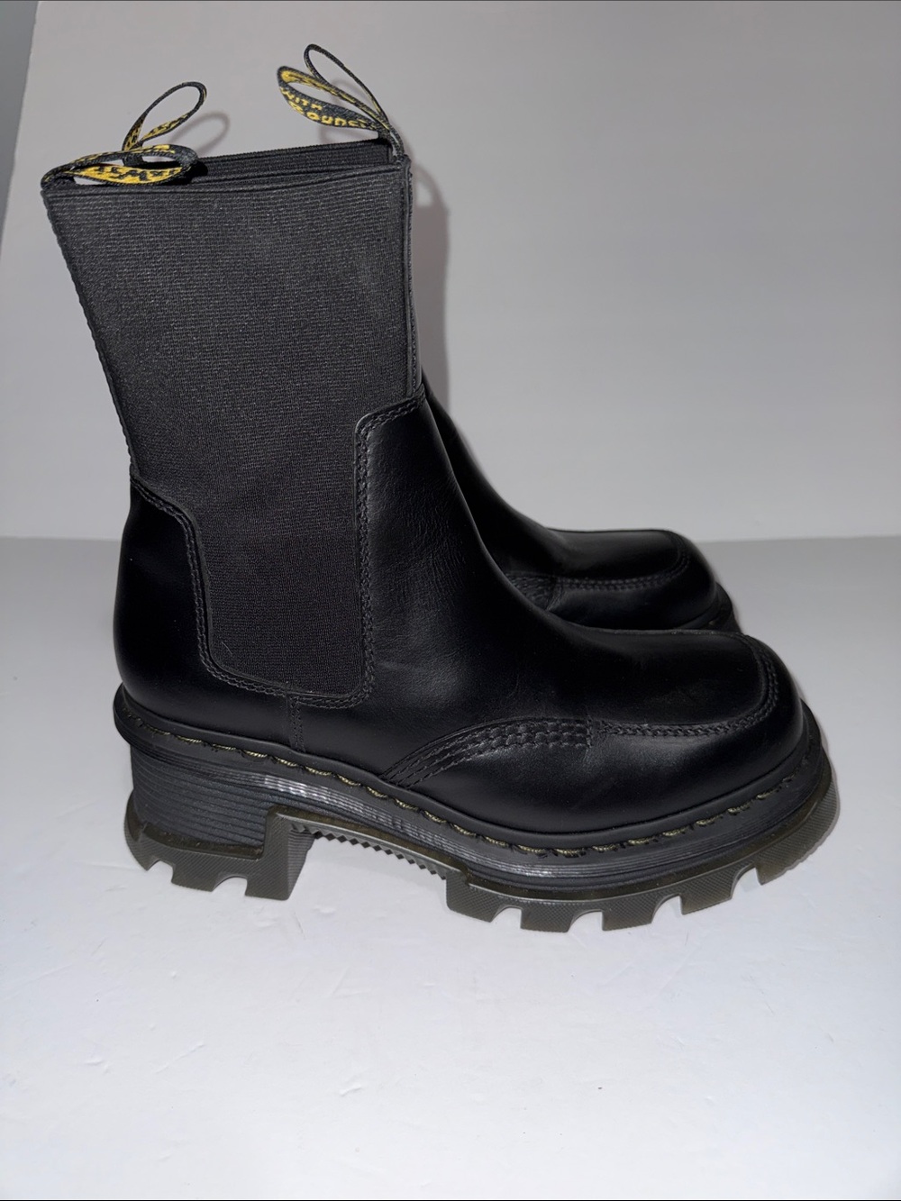 Dr. Martens Black Leather Platform Chelsea Boots with Yellow Pull Tab